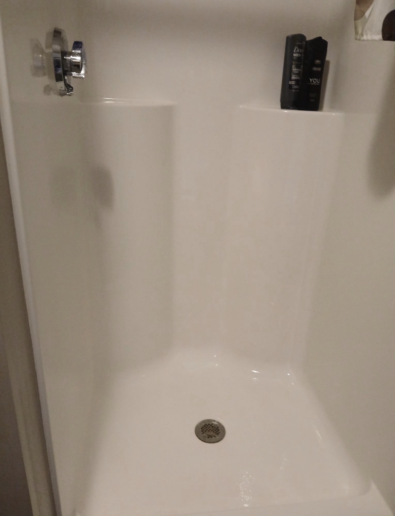 Shower floor before and after deep clean
