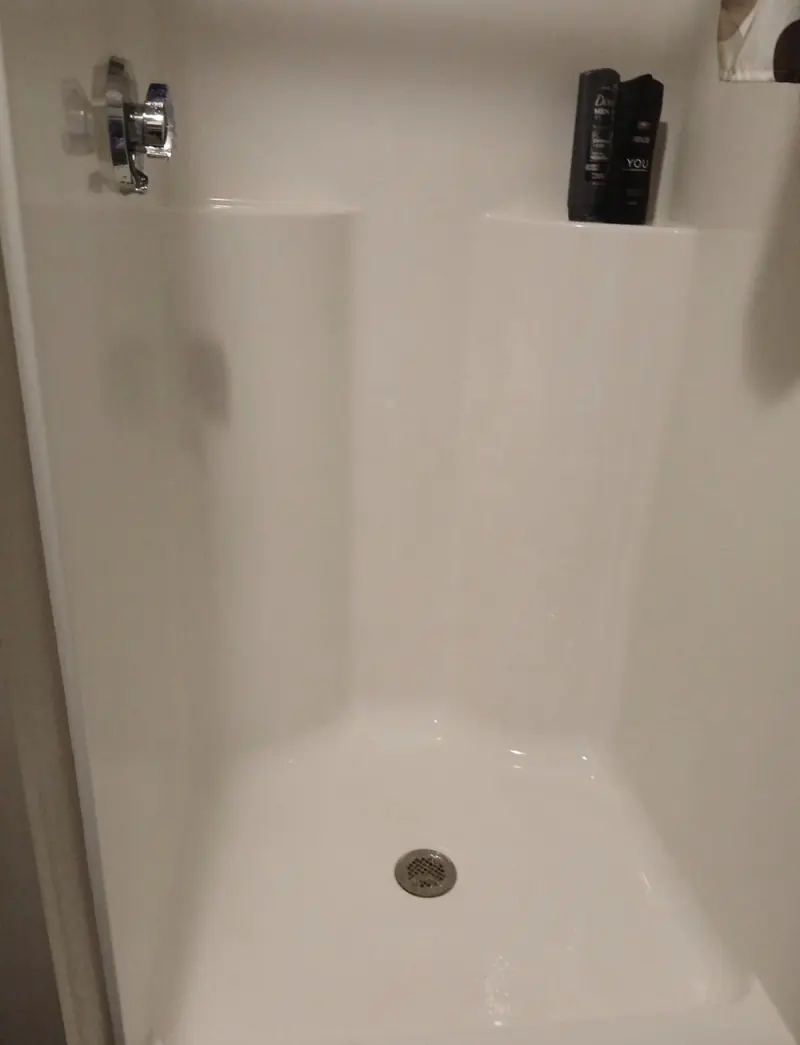 Shower floor before and after a deep clean